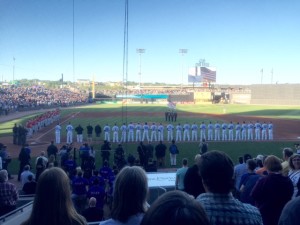 Teams line up for Saints Opening Day and inaugural game at CHS Field. 