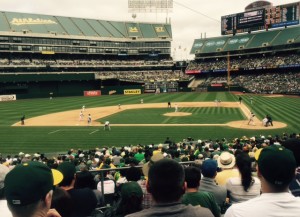 My son-in-law Amir and I had great seats for the Oakland-Chicago contest- (Thanks to my daughter Elan.) Note the tarp covering the third deck seats and "Mount Davis" in the outfield - part of what you get when you're housed in the last facility serving MLB and the NFL.  The A's fans were loud, loyal and knew the game. One fan noted that "Fans come  