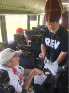 The "Rev" delivers the sacred fish to the tour operator - offically blessing our journey.